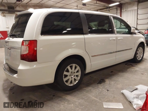 2016 Chrysler Town & Country Touring with VIN 2C4RC1BG1GR185657, listed as a IAAI auction lot 41905462 with 167,142 mi miles and . Bid and sale history available at DreamBid. Image 4.