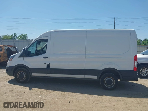 2021 Ford Transit Cargo with VIN 1FTBR1C8XMKA64837, listed as a IAAI auction lot 42008582 with 74,562 mi miles and . Bid and sale history available at DreamBid. Image 14.