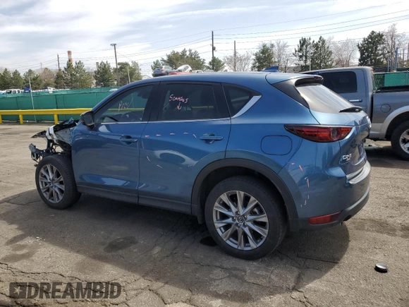 2021 Mazda CX-5 Grand Touring Reserve with VIN JM3KFBAY8M0384498, listed as a Copart auction lot 52013445 with 20,469 mi miles and Salvage Title. Bid and sale history available at carsss.com. Image 2.