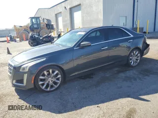 2014 Cadillac CTS Premium AWD with VIN 1G6AZ5S34E0123356, listed as a Copart auction lot 69327504 with 136,292 mi miles and Salvage Title. Bid and sale history available at DreamBid. Image 1.