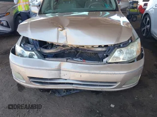 2002 Toyota Avalon XL with VIN 4T1BF28B12U264151, listed as a IAAI auction lot 42111490 with Not Provided miles and . Bid and sale history available at DreamBid. Image 6.