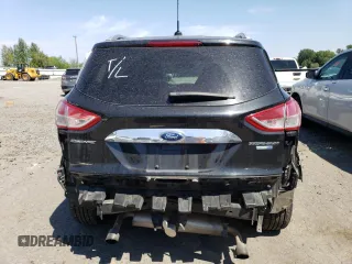 2015 Ford Escape Titanium with VIN 1FMCU9J94FUB31934, listed as a Copart auction lot 58327654 with 93,581 mi miles and Salvage Title. Bid and sale history available at carsss.com. Image 6.