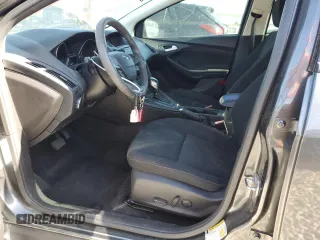 2016 Ford Focus SE with VIN 1FADP3FE8GL381855, listed as a Copart auction lot 57366645 with 104,709 mi miles and Salvage title. Bid and sale history available at DreamBid. Image 7.