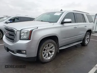 2015 GMC Yukon SLT with VIN 1GKS2BKCXFR131919, listed as a IAAI auction lot 41664827 with 149,398 mi miles. Bid and sale history available at carsss.com. Image 19.