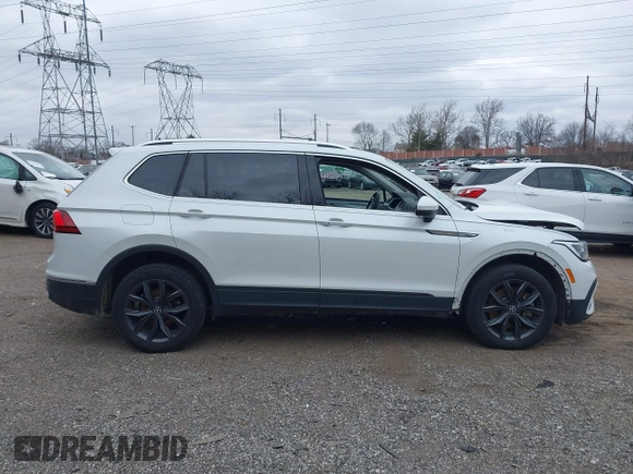 2023 Volkswagen Tiguan SE z VIN 3VV2B7AX8PM062519, wystawiony jako IAAI lot #41541819 z przebiegiem 93 873 mil mil oraz . Historia ofert i sprzedaży dostępna na DreamBid. Obrazek 13.