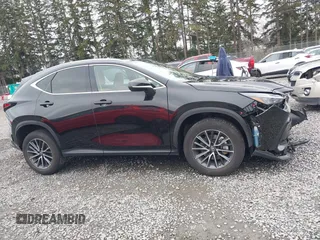 2023 Lexus NX 350h Premium z VIN 2T2GKCEZ7PC013700, wystawiony jako IAAI lot #41765156 z przebiegiem 22 423 mil mil oraz . Historia ofert i sprzedaży dostępna na DreamBid. Obrazek 13.