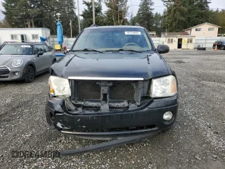 2003 GMC Envoy XL SLT with VIN 1GKES16S036191987, listed as a Copart auction lot 76776604 with 253,889 mi miles and Salvage Title. Bid and sale history available at carsss.com. Image 5.