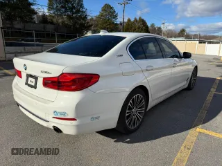 2019 BMW 5 Series 530e xDrive with VIN WBAJB1C52KB375629, listed as a Copart auction lot 86128564 with 89,988 mi miles and Clean title. Bid and sale history available at DreamBid. Image 3.