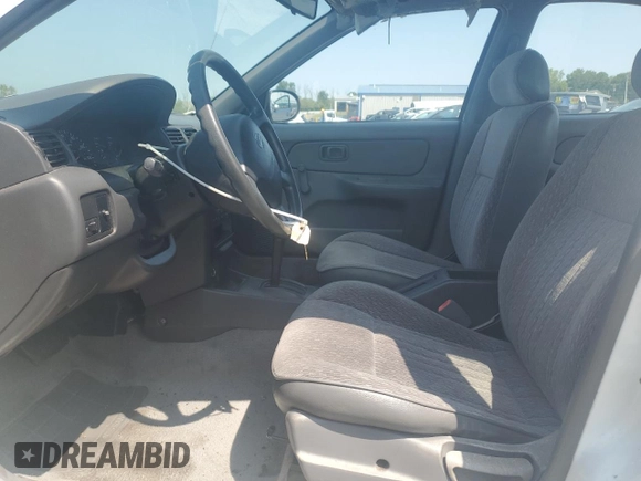 1999 Nissan Sentra XE with VIN 1N4AB41D2XC700091, listed as a Copart auction lot 59734435 with 53,658 mi miles and Salvage title. Bid and sale history available at DreamBid. Image 7.