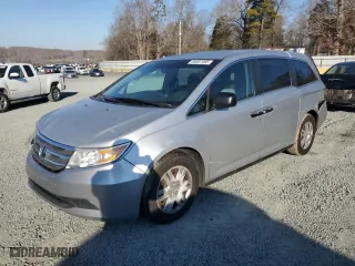 2013 Honda Odyssey LX with VIN 5FNRL5H26DB054217, listed as a Copart auction lot 88897495 with 218,468 mi miles and Salvage Title. Bid and sale history available at carsss.com. Image 1.