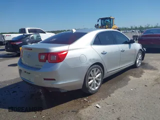 2014 Chevrolet Malibu LTZ with VIN 1G11H5SL2EF198028, listed as a IAAI auction lot 41974755 with 177,138 mi miles and . Bid and sale history available at DreamBid. Image 4.
