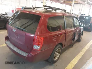 2011 Kia Sedona LX with VIN KNDMG4C78B6411157, listed as a IAAI auction lot 40671496 with 153,768 mi miles. Bid and sale history available at carsss.com. Image 4.