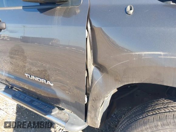 2013 Toyota Tundra z VIN 5TFRM5F18DX062669, wystawiony jako IAAI lot #41492200 z przebiegiem 100 531 mil mil oraz . Historia ofert i sprzedaży dostępna na DreamBid. Obrazek 19.
