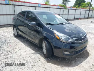 2013 Kia Rio EX with VIN KNADN4A38D6232820, listed as a IAAI auction lot 42614804 with 96,882 mi miles and . Bid and sale history available at DreamBid. Image 1.