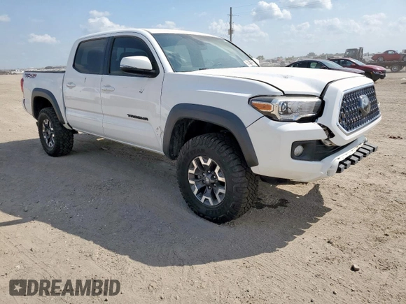 2018 Toyota Tacoma SR z VIN 3TMCZ5AN0JM178886, wystawiony jako Copart lot #56330495 z przebiegiem 71 962 mil mil oraz Szkoda całkowita • Salvage title. Historia ofert i sprzedaży dostępna na DreamBid. Obrazek 4.
