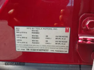 2014 Tesla Model S 60 z VIN 5YJSA1H16EFP42727, wystawiony jako IAAI lot #42544475 z przebiegiem 166 877 mil mil oraz . Historia ofert i sprzedaży dostępna na DreamBid. Obrazek 9.