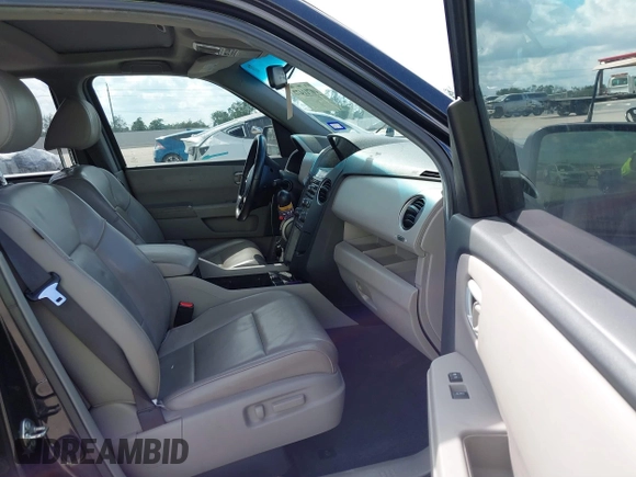 2013 Honda Pilot EX-L with VIN 5FNYF3H51DB019778, listed as a IAAI auction lot 40711477 with 165,505 mi miles and . Bid and sale history available at DreamBid. Image 5.