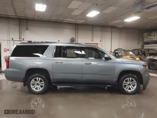 2019 Chevrolet Suburban LT with VIN 1GNSKHKC3KR195042, listed as a IAAI auction lot 41704591 with 107,166 mi miles. Bid and sale history available at carsss.com. Image 13.