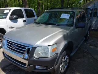 2007 Ford Explorer Sport Trac XLT with VIN 1FMEU51K47UA09905, listed as a IAAI auction lot 42063335 with 156,987 mi miles. Bid and sale history available at carsss.com. Image 2.