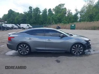 2016 Nissan Maxima SL with VIN 1N4AA6AP7GC395308, listed as a IAAI auction lot 42187762 with 154,171 mi miles and . Bid and sale history available at DreamBid. Image 14.