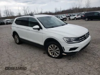 2018 Volkswagen Tiguan SEL with VIN 3VV2B7AX9JM065985, listed as a Copart auction lot 79404694 with Not provided miles and Salvage title. Bid and sale history available at DreamBid. Image 4.