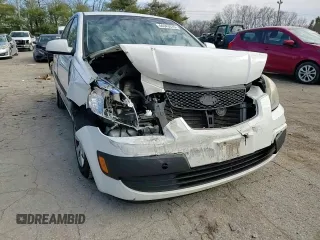 2009 Kia Rio LX with VIN KNADE223396477003, listed as a Copart auction lot 44943675 with 174,791 mi miles and Salvage Title. Bid and sale history available at carsss.com. Image 11.