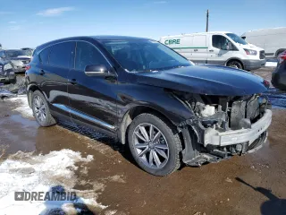 2021 Acura RDX Advance with VIN 5J8TC2H74ML809475, listed as a Copart auction lot 48109125 with 98,517 mi miles and Salvage Title. Bid and sale history available at DreamBid. Image 4.