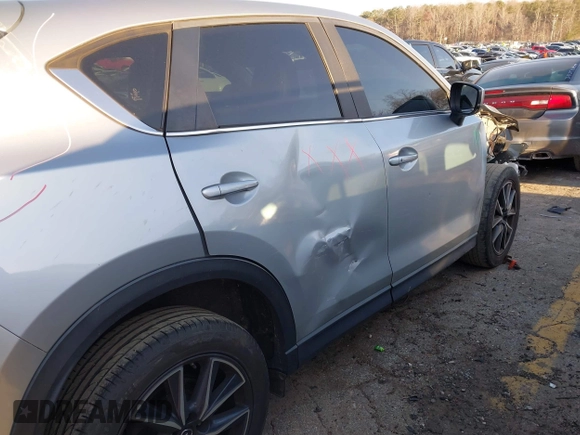 2018 Mazda CX-5 Touring with VIN JM3KFBCM6J0363767, listed as a IAAI auction lot 41776614 with 139,507 mi miles. Bid and sale history available at carsss.com. Image 19.