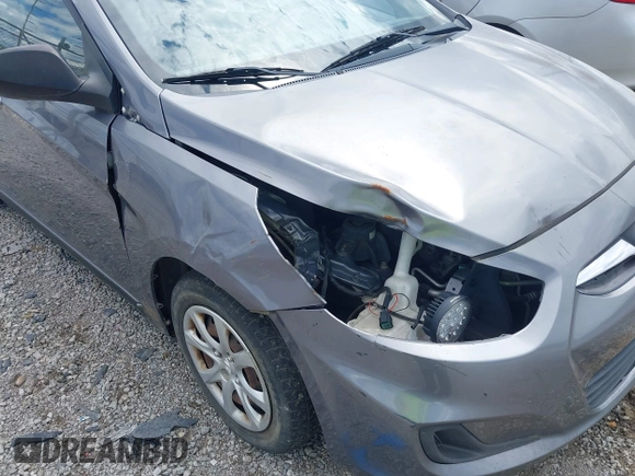 2014 Hyundai Accent GLS with VIN KMHCT4AE6EU670895, listed as a IAAI auction lot 42197066 with 142,983 mi miles and . Bid and sale history available at carsss.com. Image 6.
