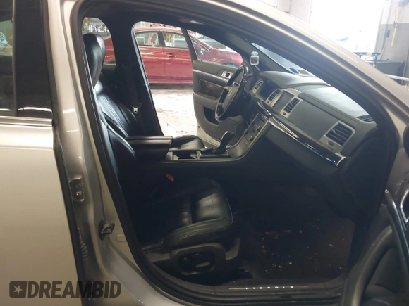 2010 Lincoln MKS with VIN 1LNHL9ER7AG602324, listed as a IAAI auction lot 41757345 with 119,979 mi miles. Bid and sale history available at carsss.com. Image 5.