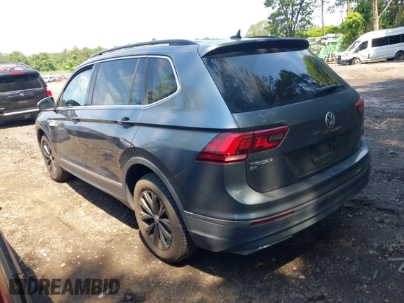 2018 Volkswagen Tiguan SEL with VIN 3VV2B7AXXJM020392, listed as a IAAI auction lot 42646948 with 58,685 mi miles and . Bid and sale history available at DreamBid. Image 3.