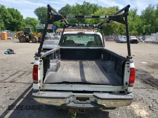 1999 Ford F-250 XL с VIN 1FTNX21F2XEC97057, выставлен на аукционе Copart как лот 57229085 с пробегом 352 998 миль миль и Списание • Salvage title. История ставок и продаж доступна на DreamBid. Изображение 6.