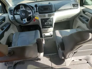 2012 Volkswagen Routan SE with VIN 2C4RVABGXCR391550, listed as a Copart auction lot 62004685 with 77,643 mi miles and Salvage title. Bid and sale history available at DreamBid. Image 8.
