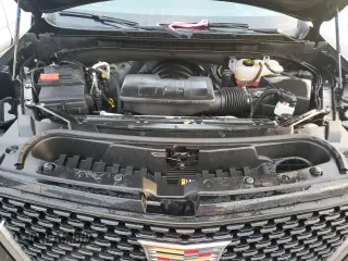 2023 Cadillac Escalade z VIN 1GYS3KKL3PR360009, wystawiony jako Copart lot #77258524 z przebiegiem 12 874 mil mil oraz Szkoda całkowita • Salvage title. Historia ofert i sprzedaży dostępna na DreamBid. Obrazek 12.