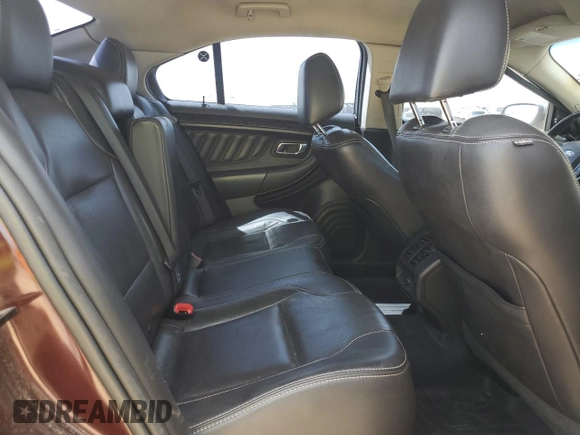 2012 Ford Taurus Limited z VIN 1FAHP2FW4CG112923, wystawiony jako Copart lot #56169085 z przebiegiem 142 687 mil mil oraz Szkoda całkowita • Salvage title. Historia ofert i sprzedaży dostępna na DreamBid. Obrazek 10.