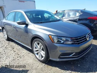 2019 Volkswagen Passat 2.0T Wolfsburg Edition with VIN 1VWLA7A38KC003562, listed as a IAAI auction lot 41704839 with 67,313 mi miles. Bid and sale history available at carsss.com. Image 1.