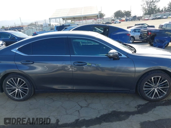 2023 Lexus ES 300h with VIN 58ADA1C15PU034077, listed as a IAAI auction lot 41956543 with 72,661 mi miles and . Bid and sale history available at DreamBid. Image 13.