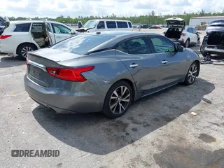 2016 Nissan Maxima SR with VIN 1N4AA6AP4GC426126, listed as a IAAI auction lot 42417796 with 120,274 mi miles and . Bid and sale history available at DreamBid. Image 4.