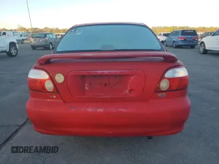 2001 Kia Sephia z VIN KNAFB121715066725, wystawiony jako Copart lot #86552964 z przebiegiem 76 915 mil mil oraz Tytuł czysty. Historia ofert i sprzedaży dostępna na DreamBid. Obrazek 6.
