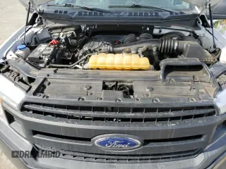 2018 Ford F-150 XL with VIN 1FTEX1CB8JKD59638, listed as a Copart auction lot 47296195 with 162,040 mi miles and Salvage title. Bid and sale history available at DreamBid. Image 11.