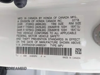 2018 Honda CR-V Touring with VIN 2HKRW2H91JH665241, listed as a IAAI auction lot 42638694 with 62,066 mi miles and . Bid and sale history available at DreamBid. Image 9.