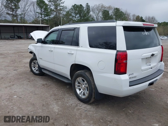 2020 Chevrolet Tahoe LT with VIN 1GNSKBKC2LR253012, listed as a IAAI auction lot 41870002 with 127,789 mi miles and . Bid and sale history available at DreamBid. Image 3.