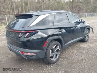 2022 Hyundai Tucson Hybrid SEL Convenience with VIN KM8JFCA15NU015911, listed as a IAAI auction lot 41875212 with 66,881 mi miles. Bid and sale history available at carsss.com. Image 4.