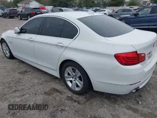 2013 BMW 5 Series 528i xDrive with VIN WBAXH5C5XDD106981, listed as a IAAI auction lot 42012477 with 140,259 mi miles. Bid and sale history available at carsss.com. Image 3.