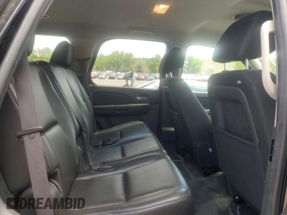 2013 Chevrolet Tahoe Commercial with VIN 1GNSK2E02DR342419, listed as a Copart auction lot 57908885 with 76,486 mi miles and Salvage title. Bid and sale history available at DreamBid. Image 11.