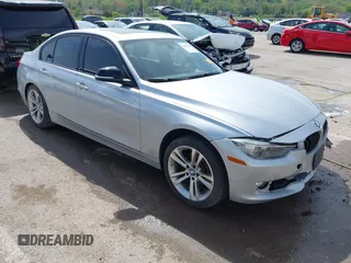 2014 BMW 3 Series 328i xDrive with VIN WBA3B5C51EP543588, listed as a IAAI auction lot 42105211 with 117,717 mi miles and . Bid and sale history available at DreamBid. Image 1.