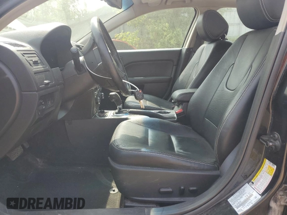 2012 Ford Fusion SEL with VIN 3FAHP0JA8CR257746, listed as a Copart auction lot 60911705 with 162,808 mi miles and Clean title. Bid and sale history available at DreamBid. Image 7.