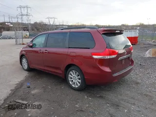 2013 Toyota Sienna XLE with VIN 5TDDK3DC1DS068215, listed as a IAAI auction lot 41610737 with 168,186 mi miles and . Bid and sale history available at DreamBid. Image 3.