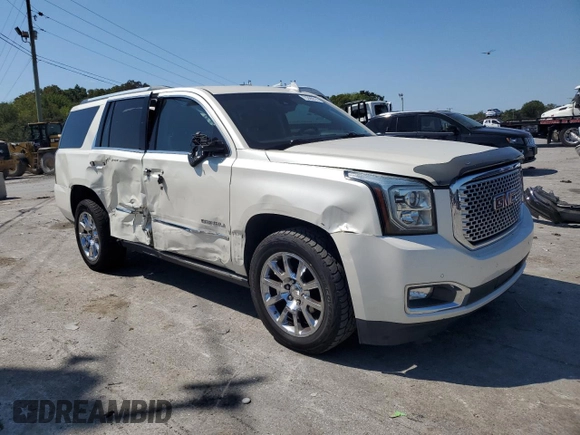 2015 GMC Yukon Denali with VIN 1GKS2CKJ3FR663324, listed as a Copart auction lot 70306614 with 154,234 mi miles and Salvage Title. Bid and sale history available at carsss.com. Image 4.