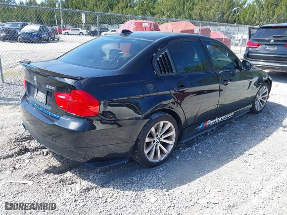 2011 BMW 3 Series 328i with VIN WBAPH7C54BE676462, listed as a IAAI auction lot 41769898 with 208,688 mi miles. Bid and sale history available at carsss.com. Image 4.